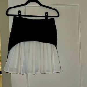 Faux leather black and white pleated skirt. Size small. Cute cute!